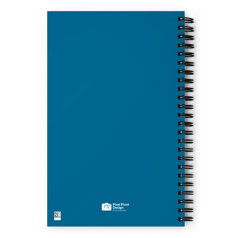 Blue notebook with spiral binding on a white background