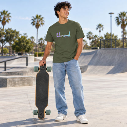 Man wearing a green t-shirt with a printed design and text 'blessed'