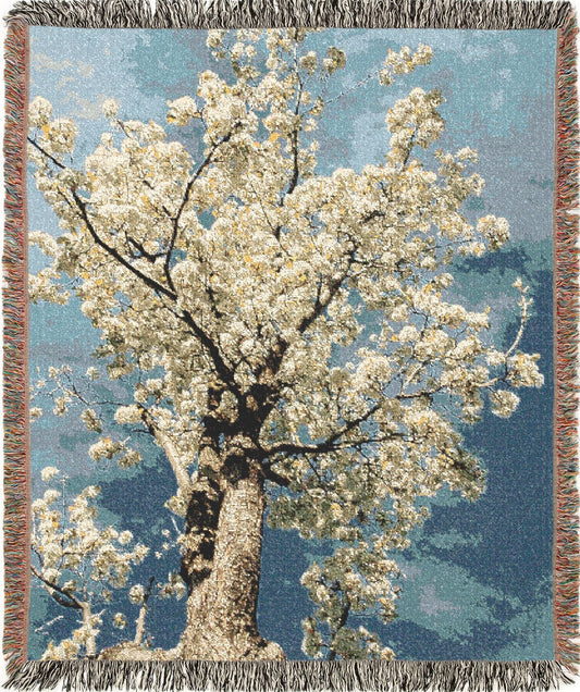 Woven blanket with a floral design on a blue background