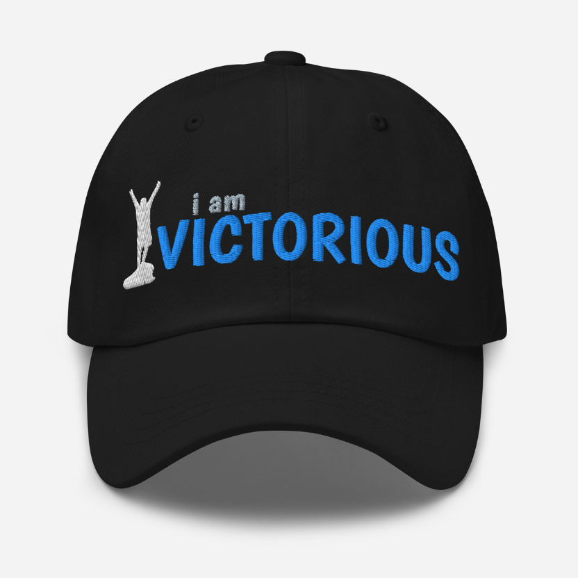 Black cap with 'i am VICTORIOUS' text and silhouette on a white background