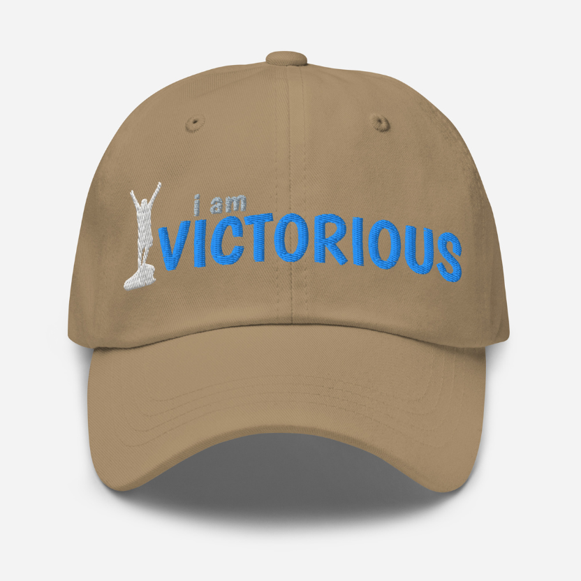 Brown cap with 'i am VICTORIOUS' text and logo on a white background