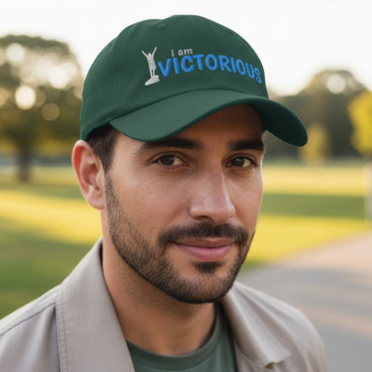 Dark green unstructured dad cap with 'i am VICTORIOUS' text and silhouette 