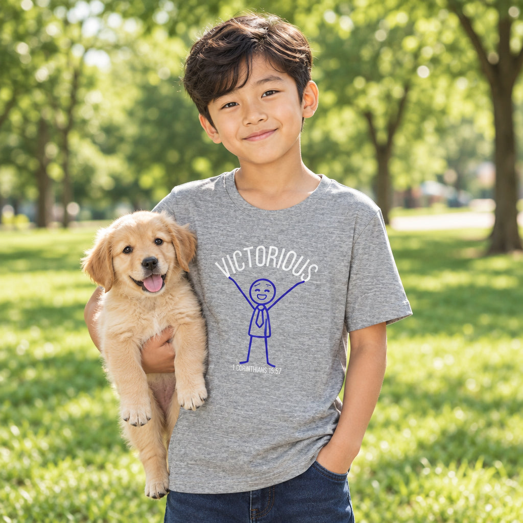 Child wearing a gray t-shirt with a graphic design with stick figure holding up word "victorious"