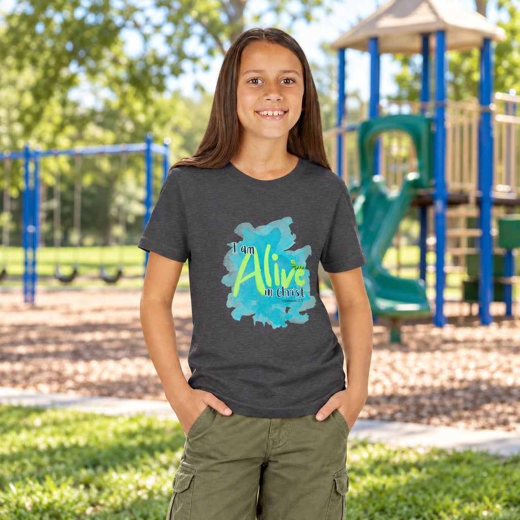 Girl wearing a gray t-shirt with a colorful graphic of Alive